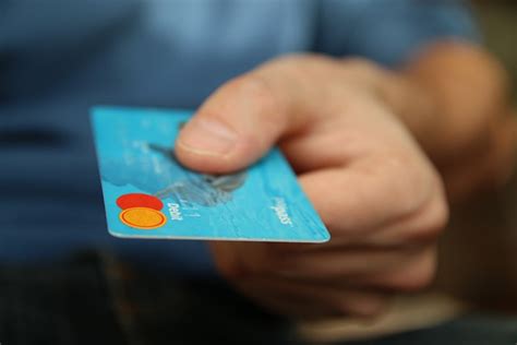 Photo of hand holding a credit card